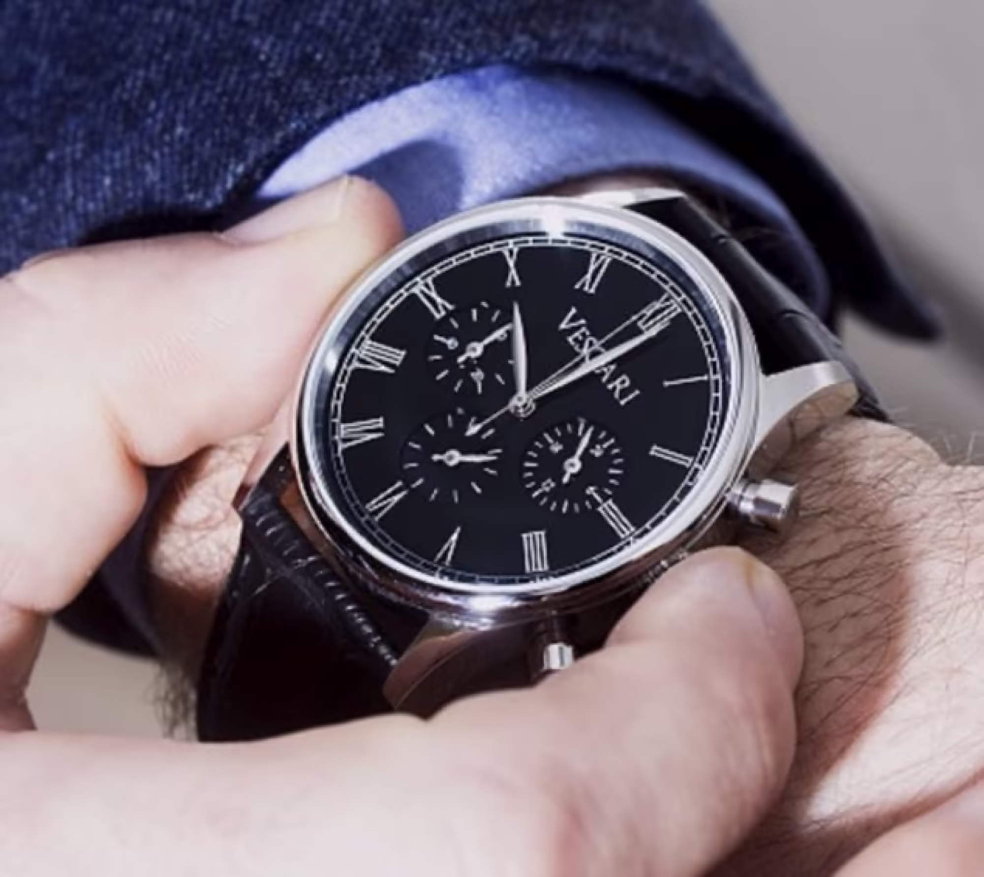Cleaning a vintage watch with a soft cloth at Watch Empire Dublin